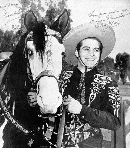 Old black and white picture of Duncan Renaldo as the Cisco Kid character
